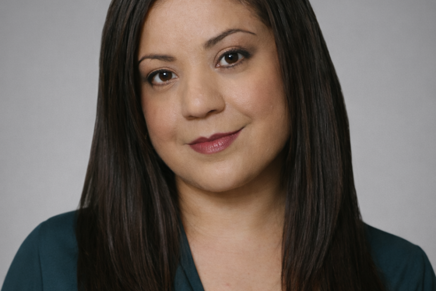 Close up headshot of Michelle Manzales looking at camera.