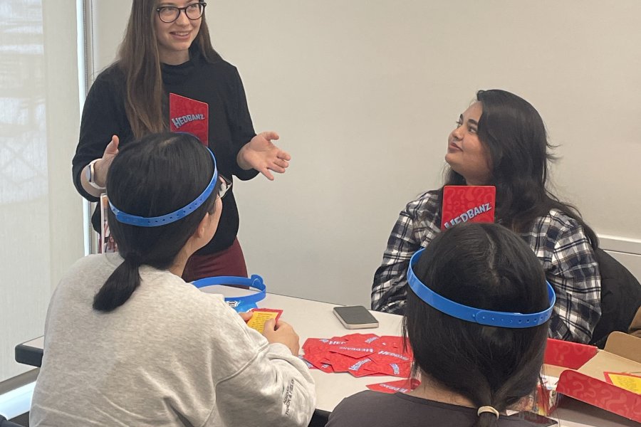 Global Engagement Program Intern, Cai Hesse, talking to students 