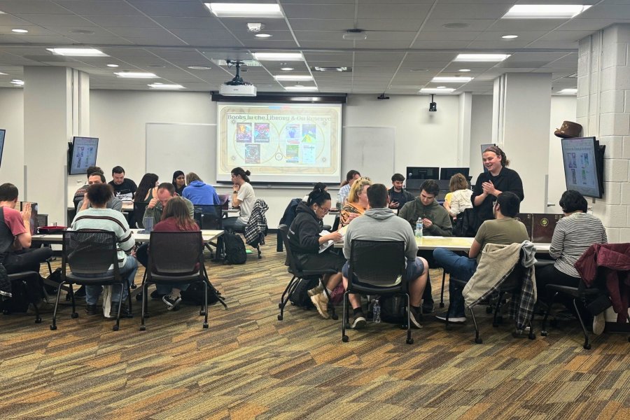 Students learn and play Dungeons & Dragons at a 3D&D Adventure event.