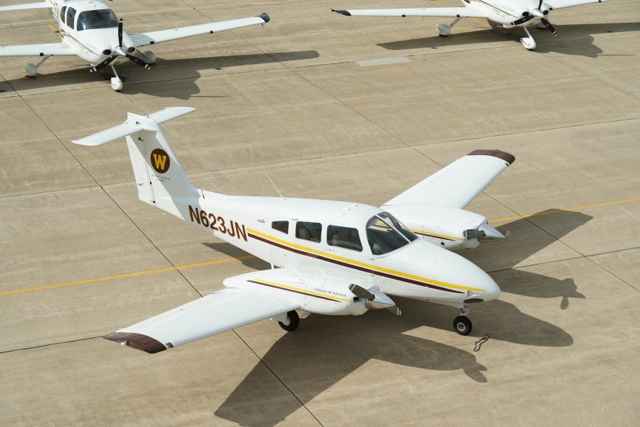 An airplane sits on the tarmac.