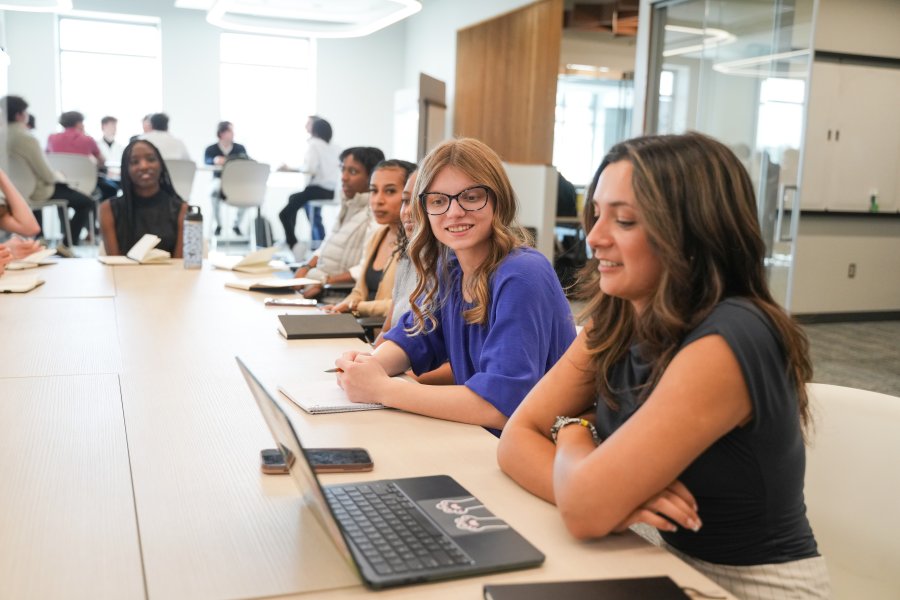Students work in a research group at Sleeping Giant Capital