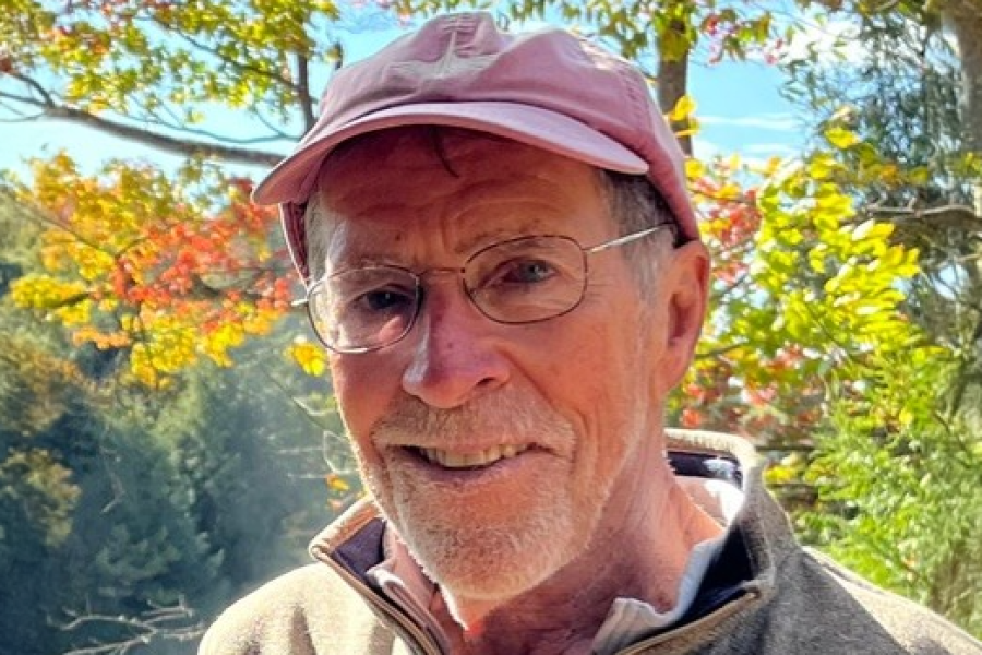 David Sluyter wearing a light shirt and red baseball cap