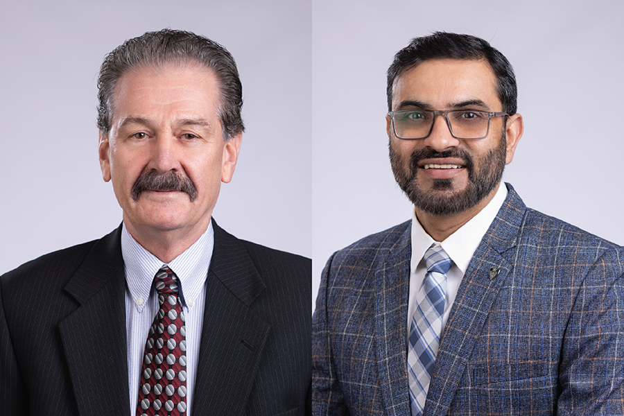 Finance professors David Burnie on the left and Jagjit Saini on the right
