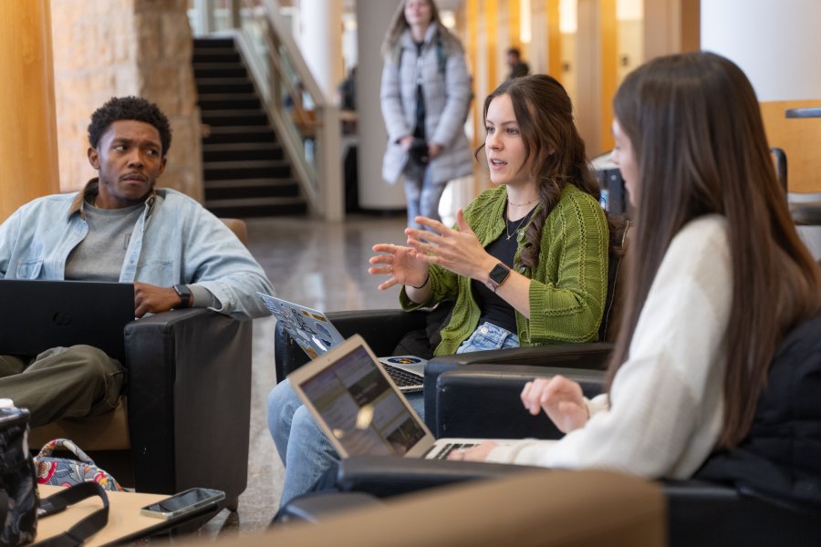 A group of students studying together on WMU campus.