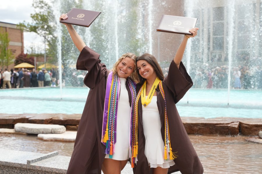 Students celebrating at spring commencement