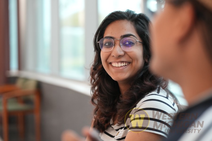 Engineering student smiling during study group
