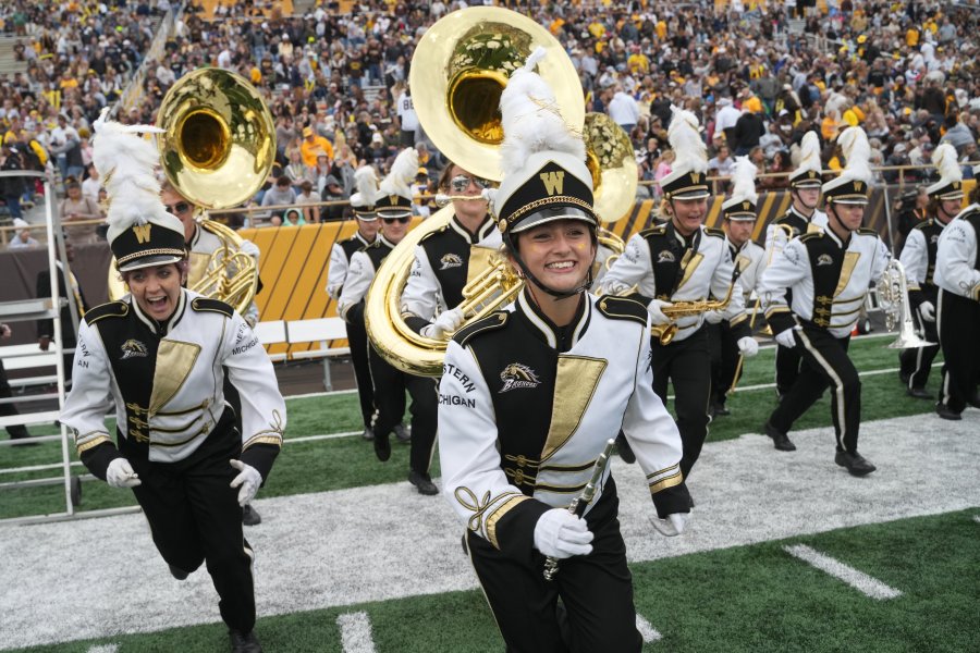 Homecoming band on the football field 