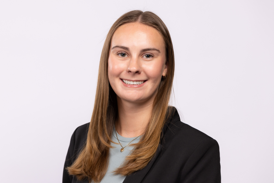 Nicole Sherman wearing a dark blazer