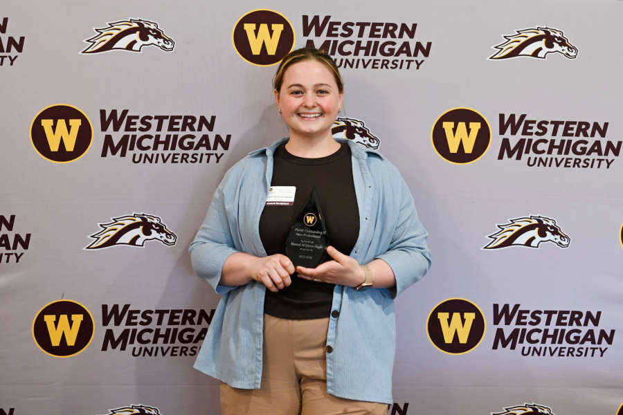 Hannah McQueen-Ziegler with PSAW's Outstanding New Professional Award in 2026.