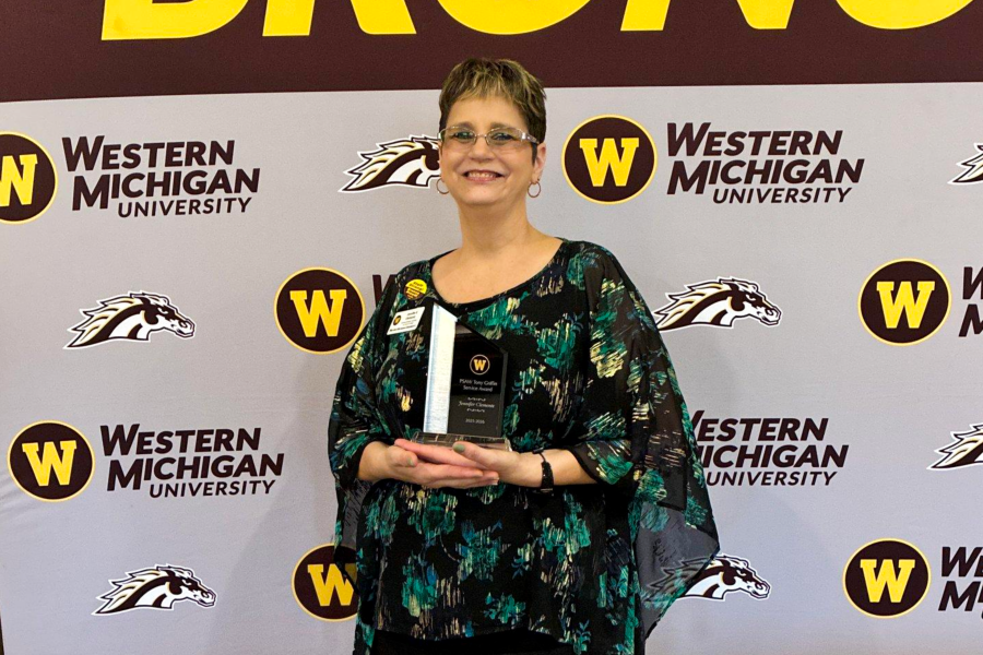 Jennifer Clements with PSAW's Tony Griffin Service Award in 2026.