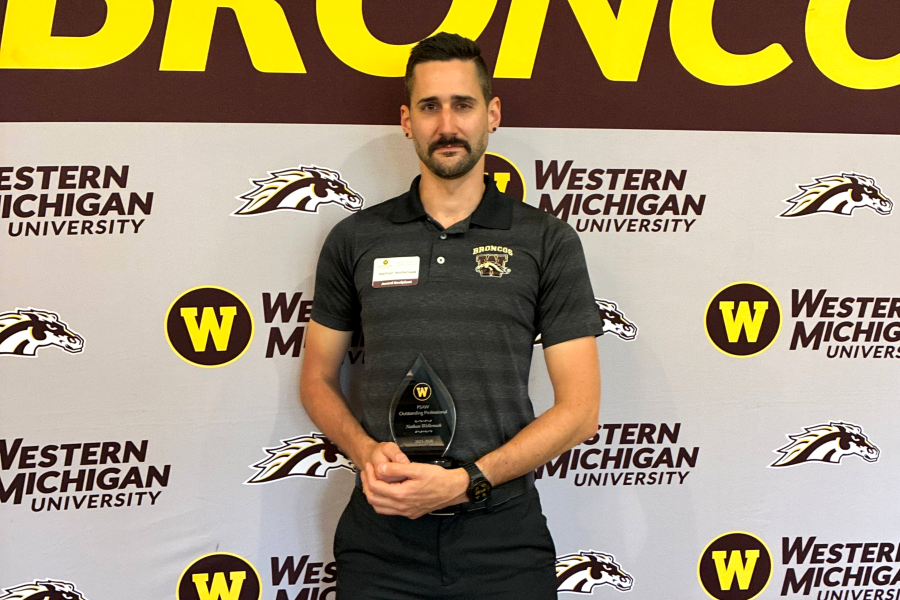 Nathan Wollensak with PSAW's Outstanding Professional Award in 2026..
