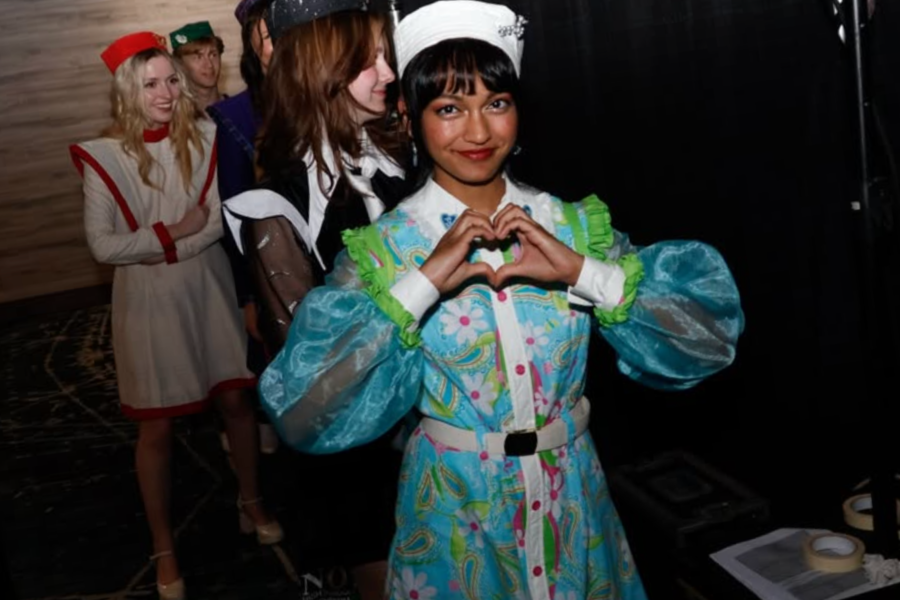 Fashion students behind the stage.