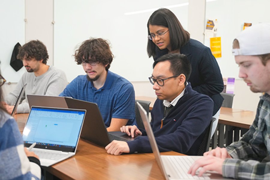 A professor talking to the students