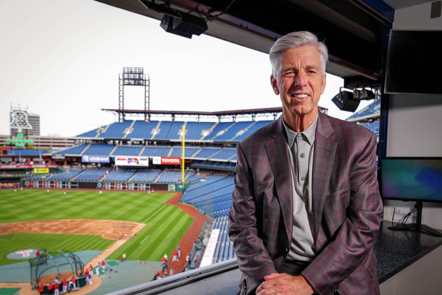 David Dombrowski sits in a box overlooking a baseball stadium.