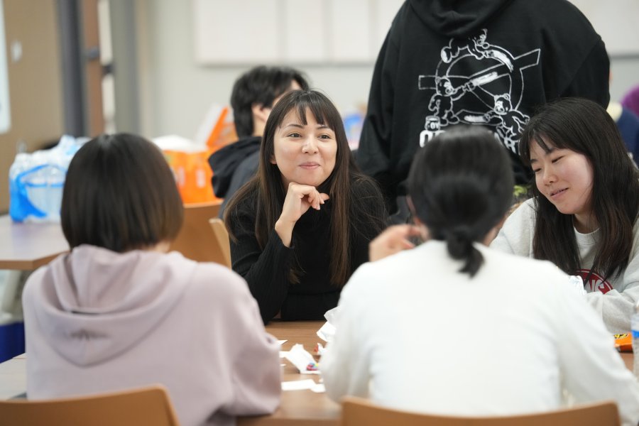 Students engage in discussion during class.