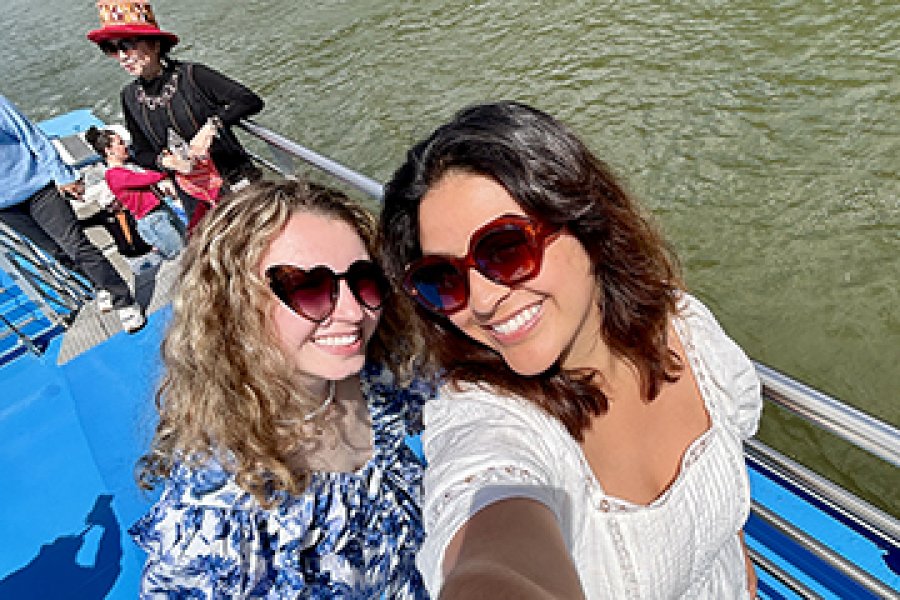 Two women in a selfie in front of a river