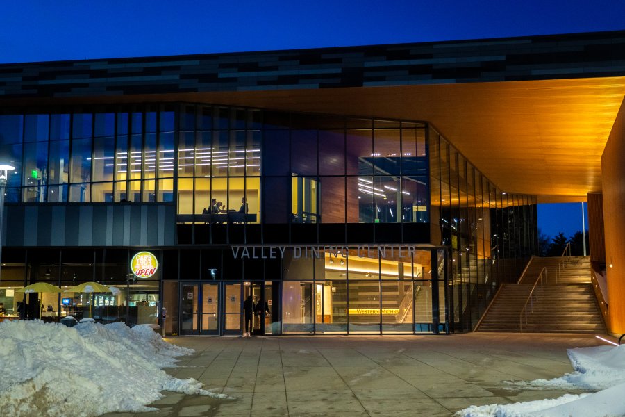 Exterior of the Valley Dining Center at night.