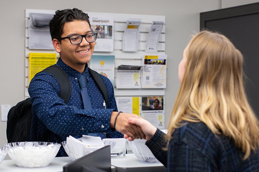 SPuRS Student in the SPuRS office getting help