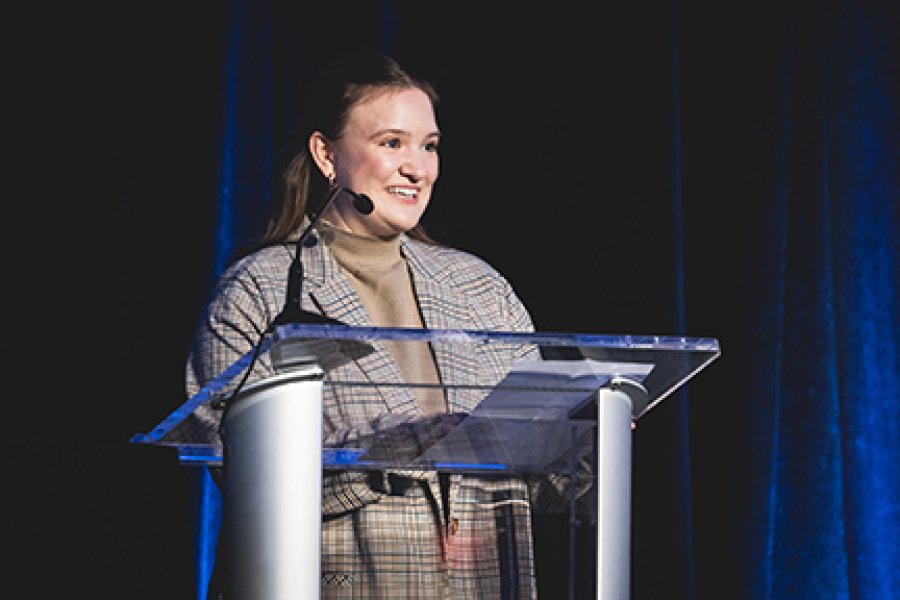 A student at a podium