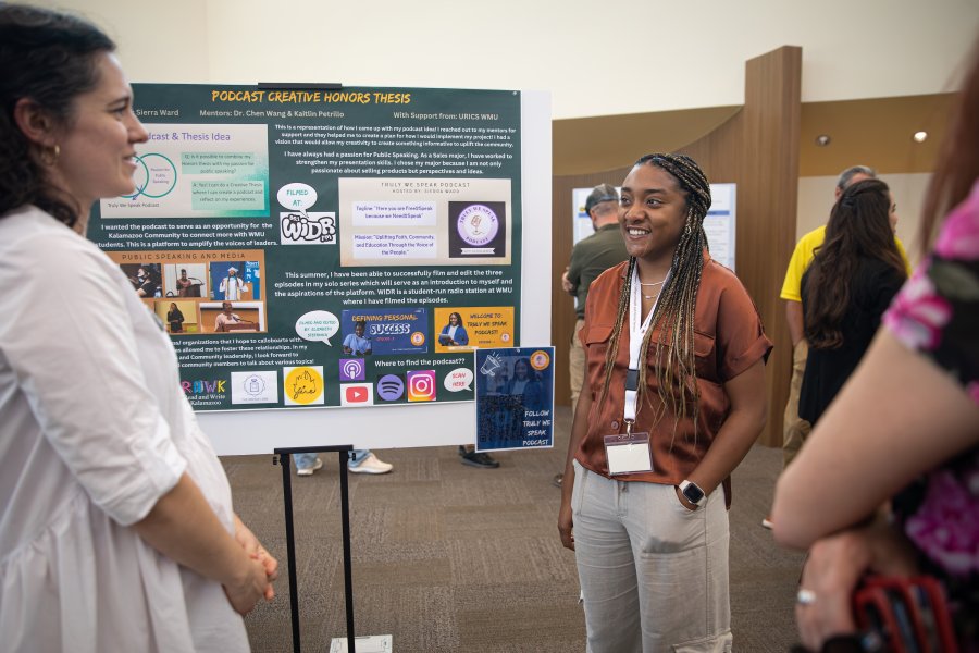 Sierra Ward displays her summer thesis project at Lee Honors College.