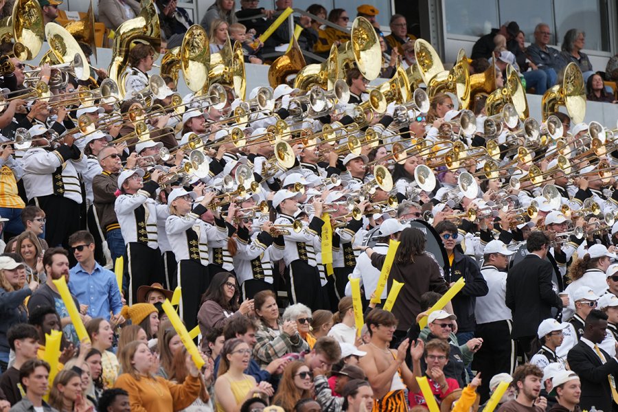 The Bronco Marching Band plays in the Waldo Stadium stands in the middle of cheering fans at Homecoming 2025.