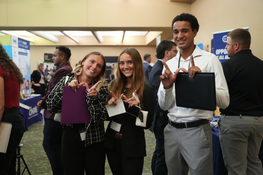 Students show the Bronco W at a career fair.