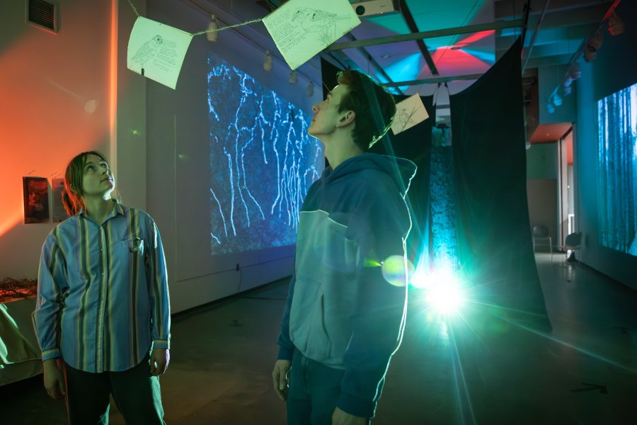 WMU students observing art on campus