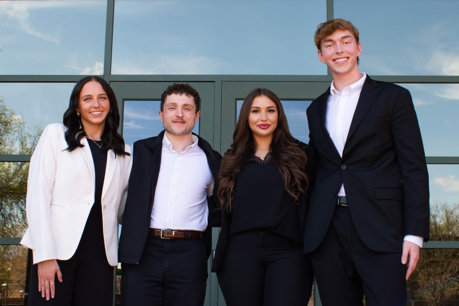 Brooke Ricketson, Storm Rowles, Medina Azookari and George LaForce, the WMU World Champion Digital Marketing team outside of the Haworth College of Business.