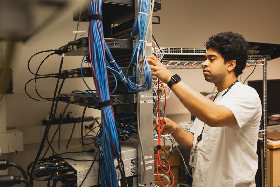 Raiyan Wasi working on a computer 