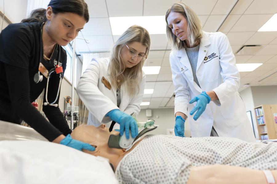 Nursing classroom with instructor.