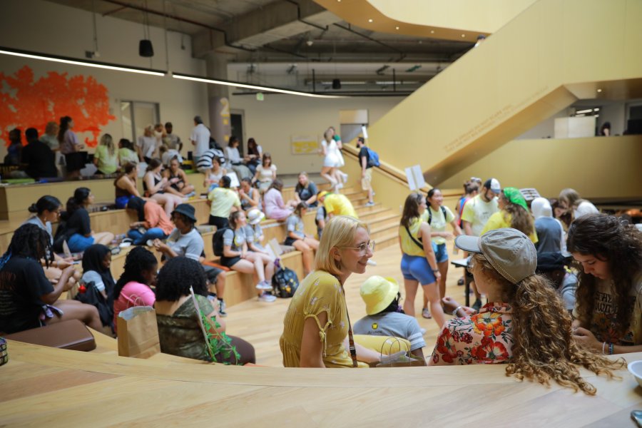 Students hanging out on the gathering stairs in the WMU Student Center.