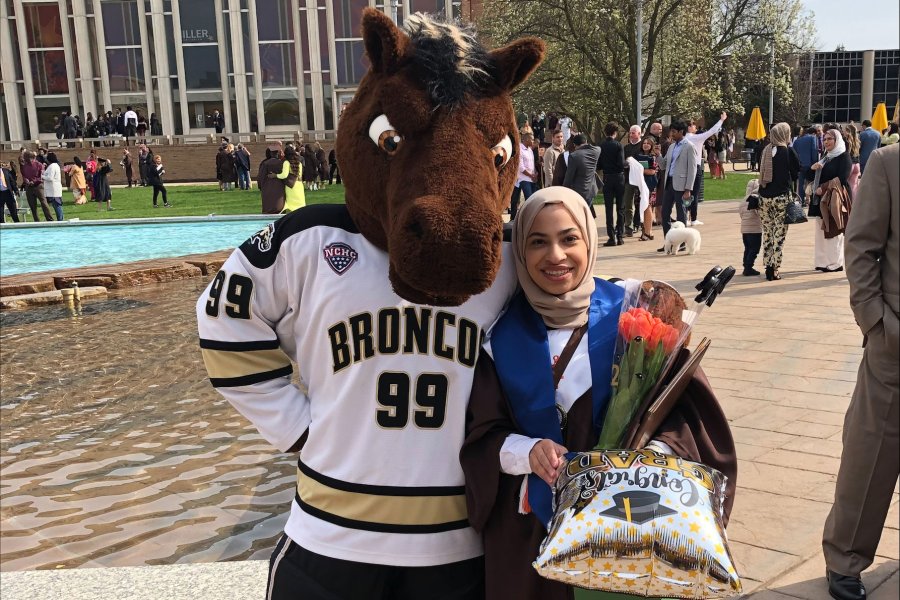 Maruj Jamal and Buster Bronco at her graduation. 