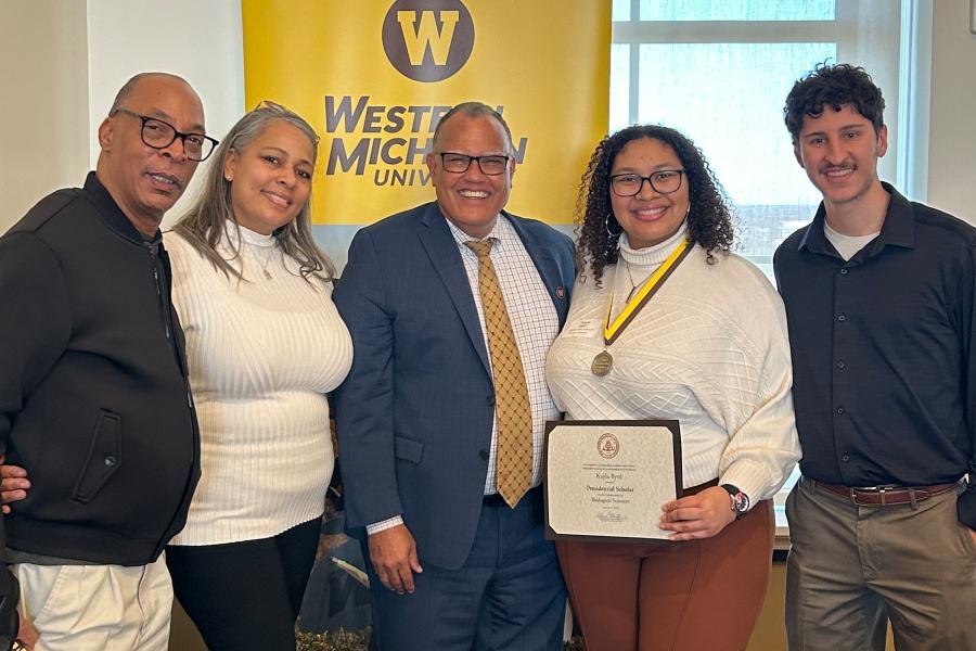 President Montgomery with Presidential Scholar Kayla Byrd and supporters