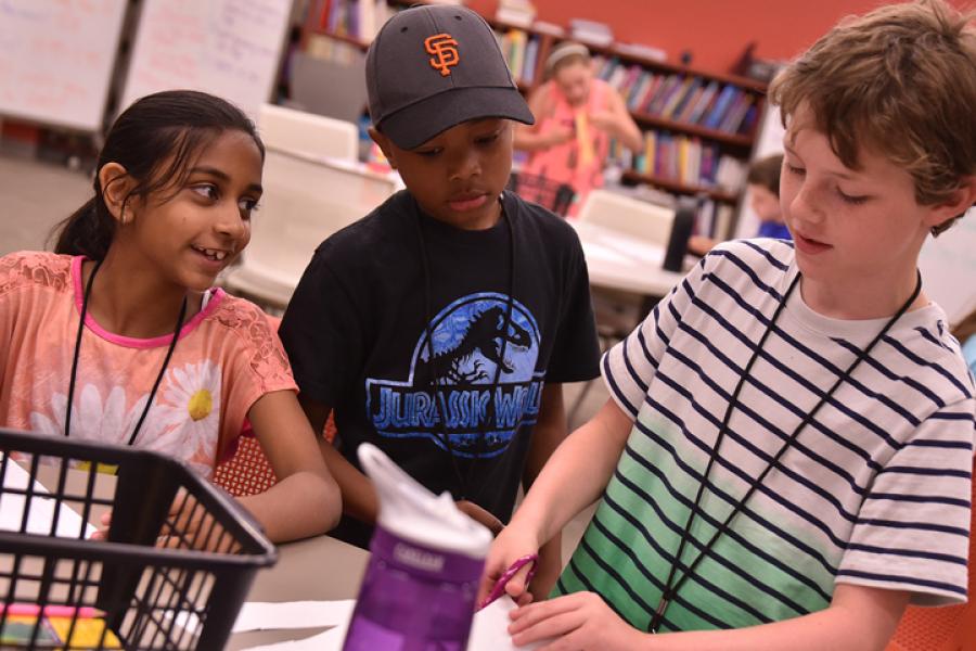 young students doing projects in the reading center