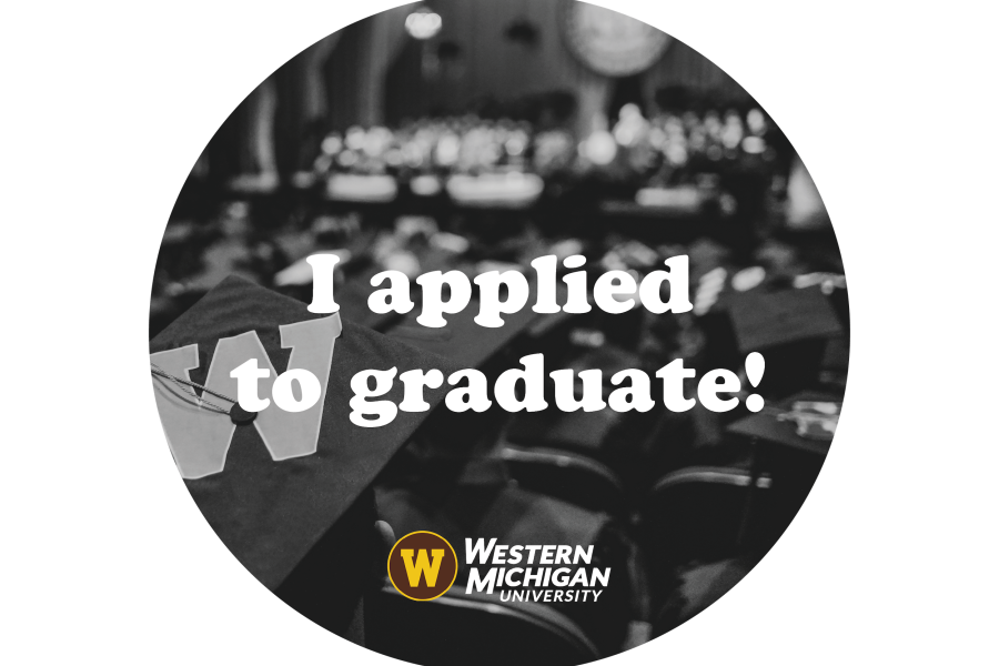 A graduate's view of the Miller Auditorium stage during commencement