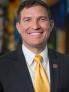 President Russ Kavalhuna