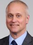 Professional headshot of Greg Rozeveld