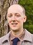 Headshot photo of man. 
