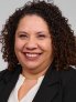 Professional headshot of Michele Sanchez.