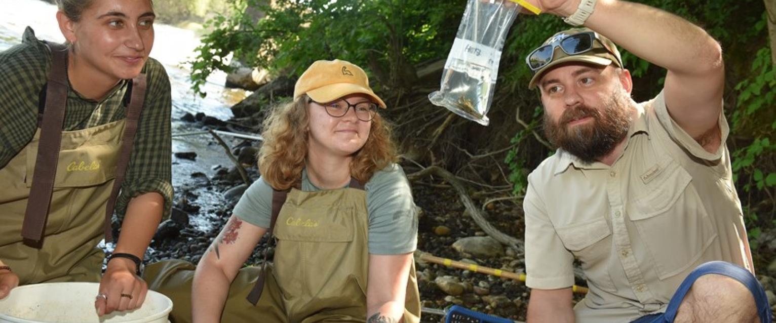 students examining water samples from the Kalamazoo river