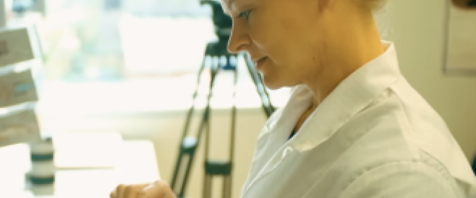 woman in lab coat
