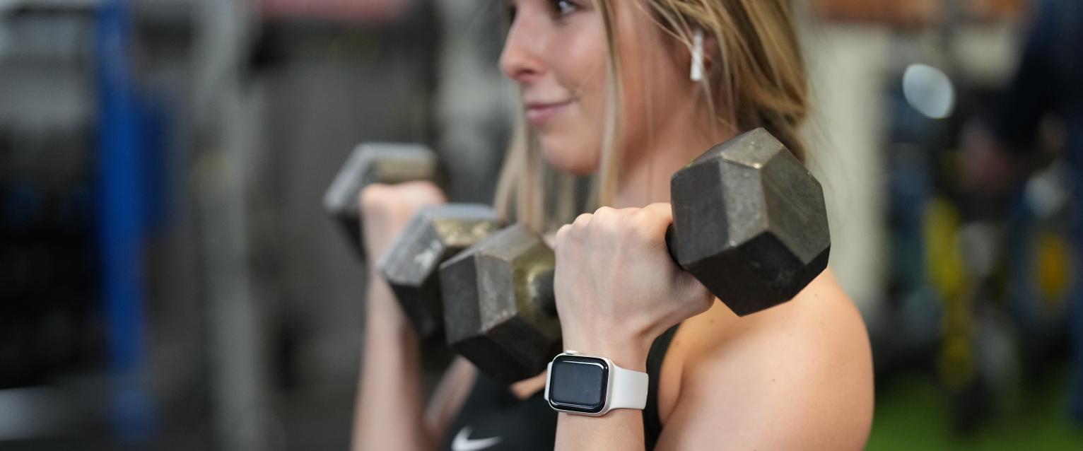 Sara with a dumbell curl at West Hills