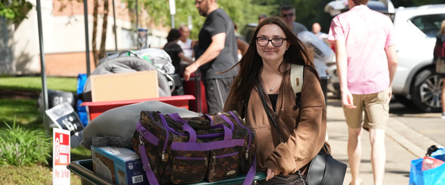 Student moving in to the residence halls