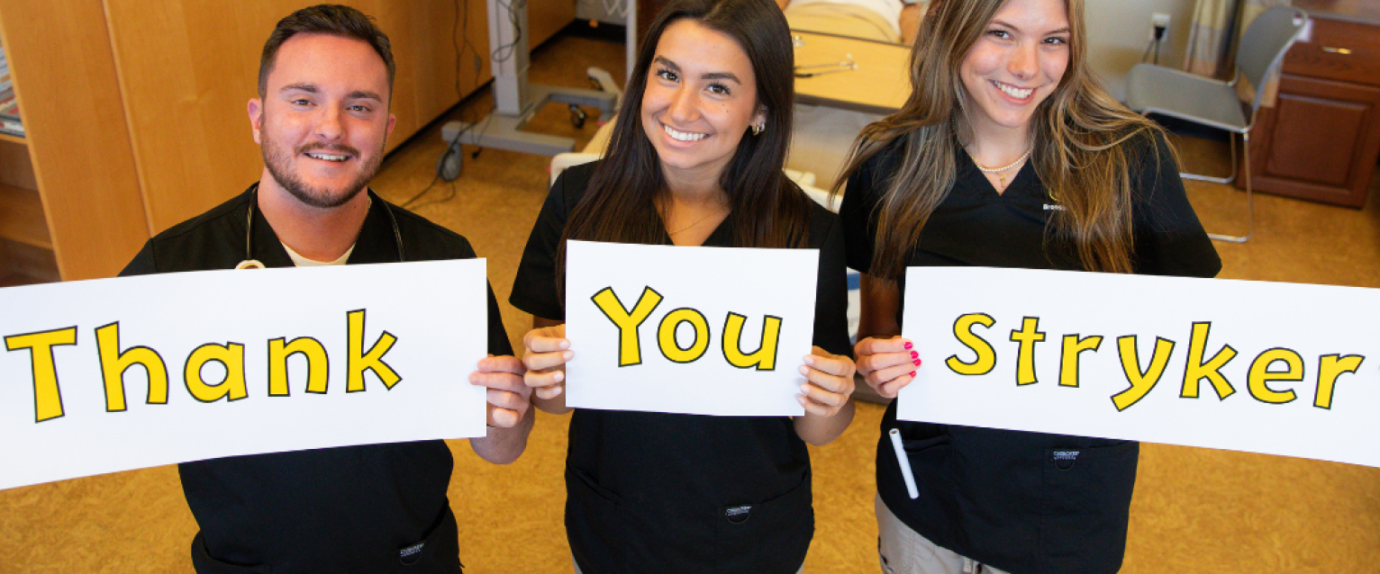nursing students holding signs that read thank you stryker