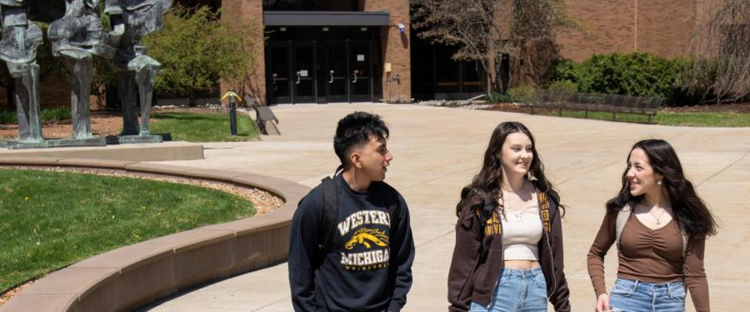Students wearing Bronco gear on campus.