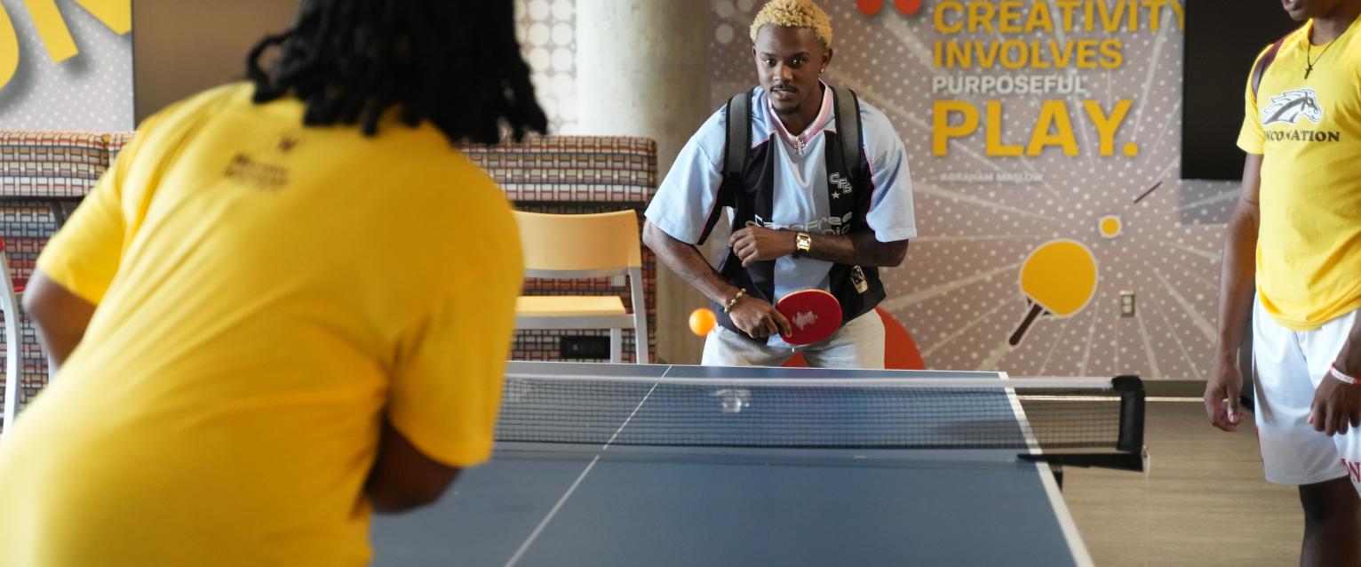 Students playing ping pong in the WMU Student Center
