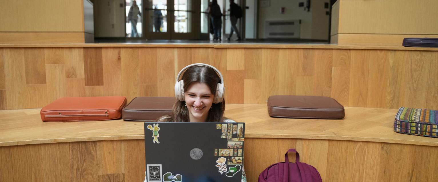 A student studies on the Gathering Stairs