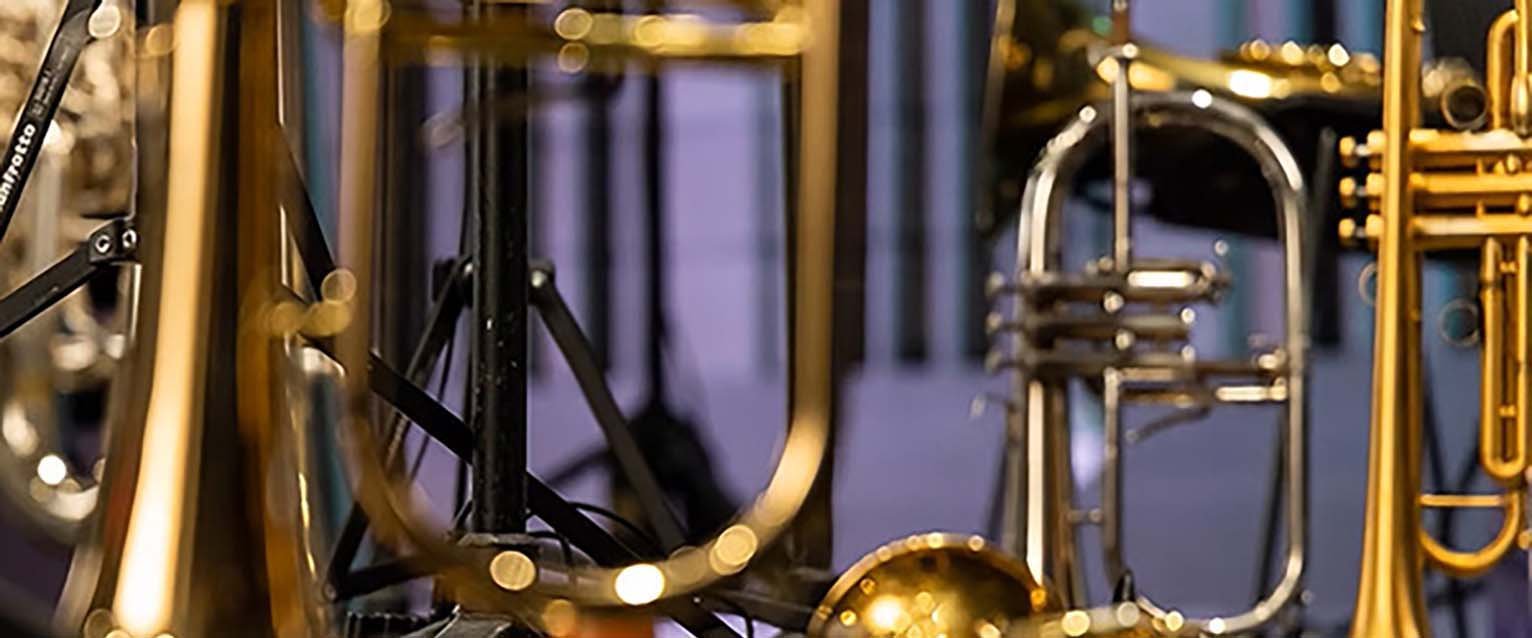 close-up photo of trumpets and flugelhorns in focus and out