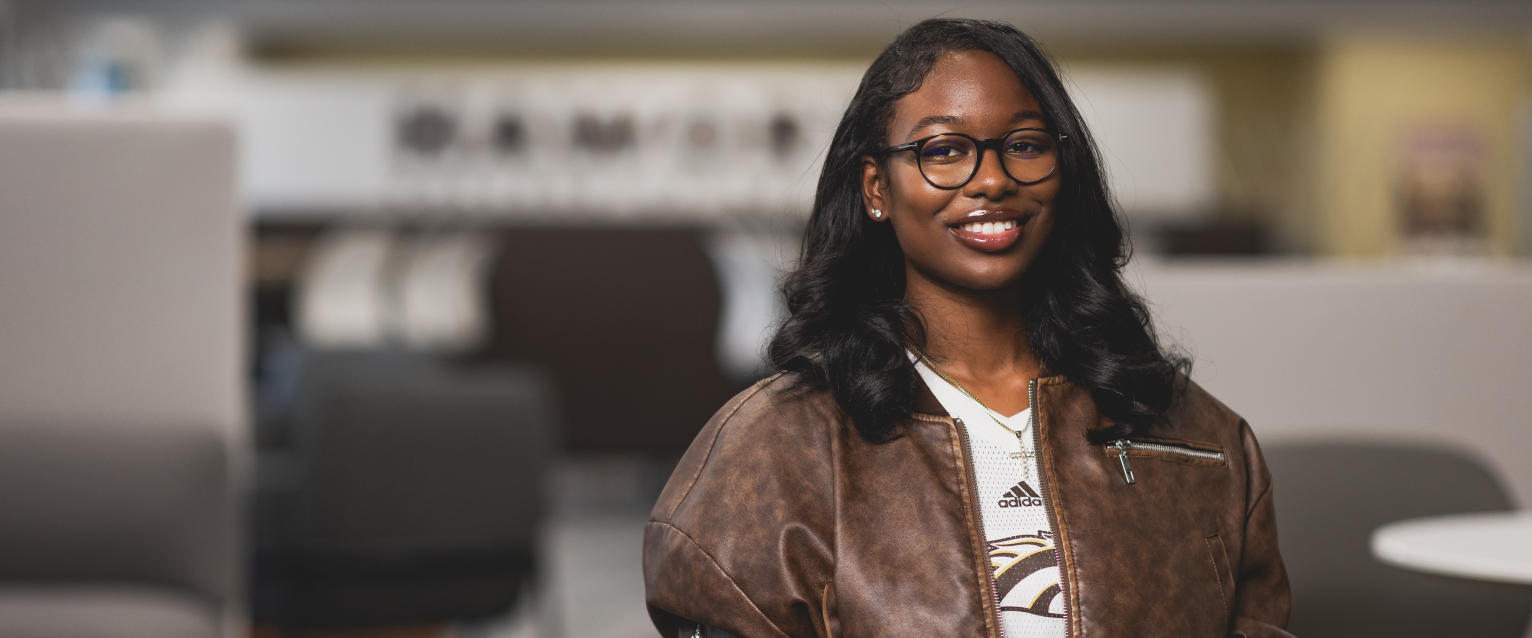Photo of Jailah Topp in the Schneider Hall cafe