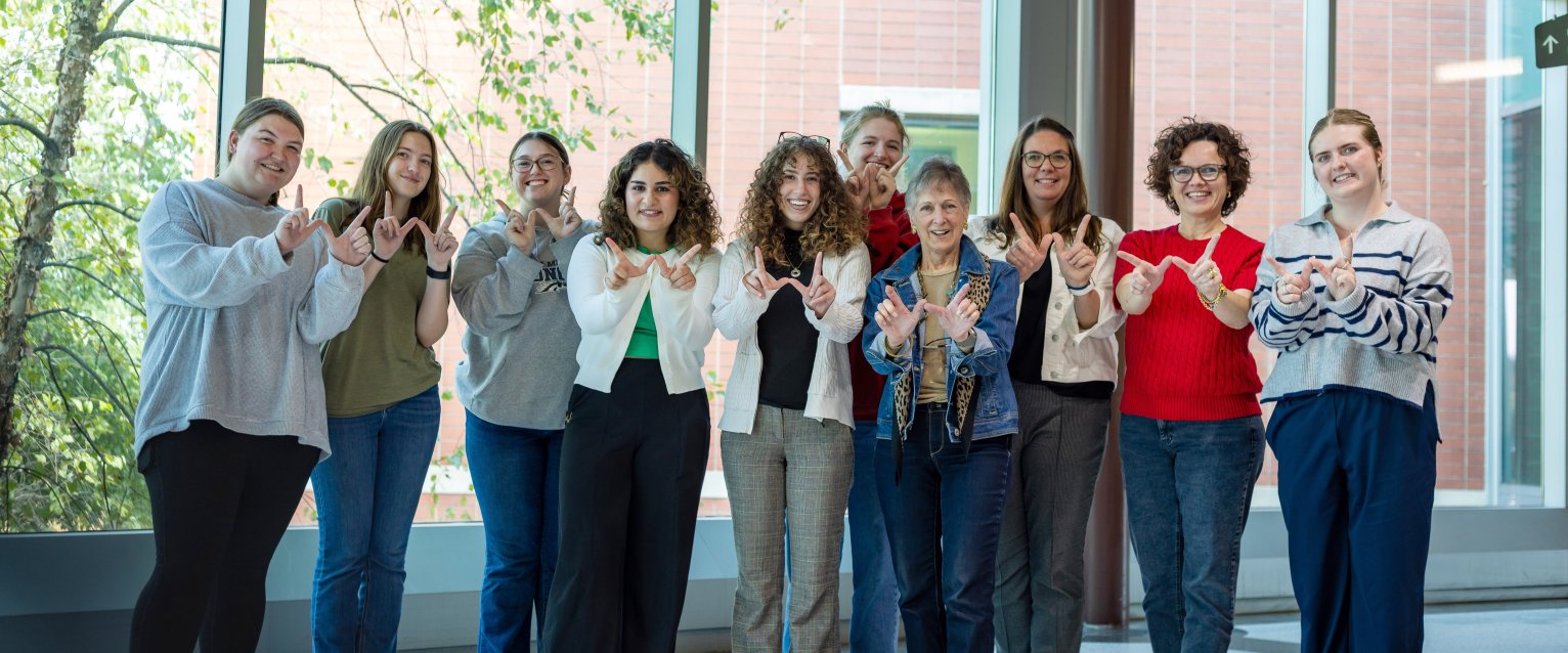 Margean Gladysz, B.S.E.75, with Society of Women Engineers in Floyd Hall